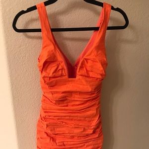 An orange dress from antelier Nicole Miller